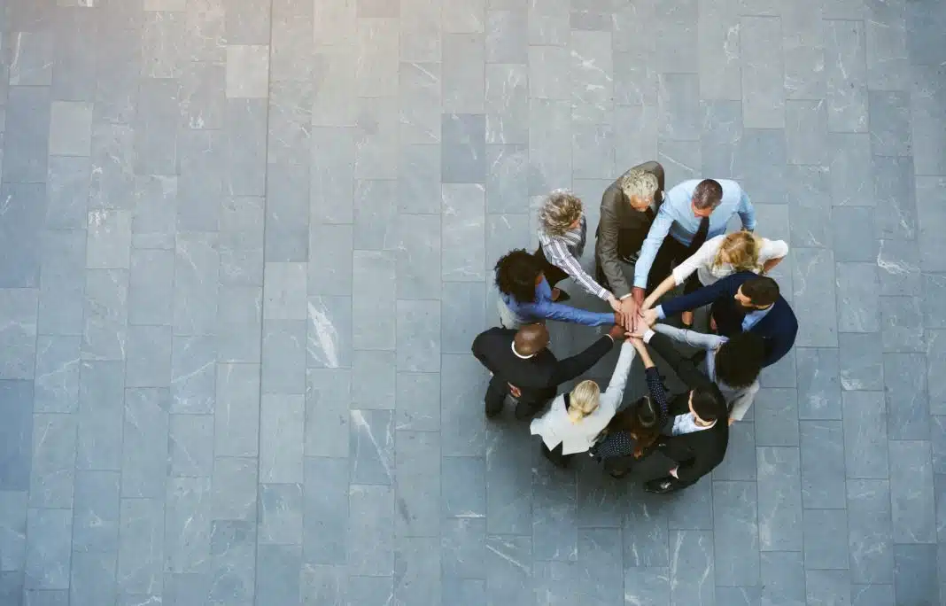 Multiracial business people having teambuilding with hands stacked