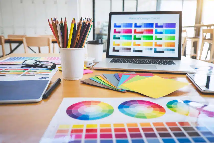 Graphic designer object tool and color swatch samples at workspa