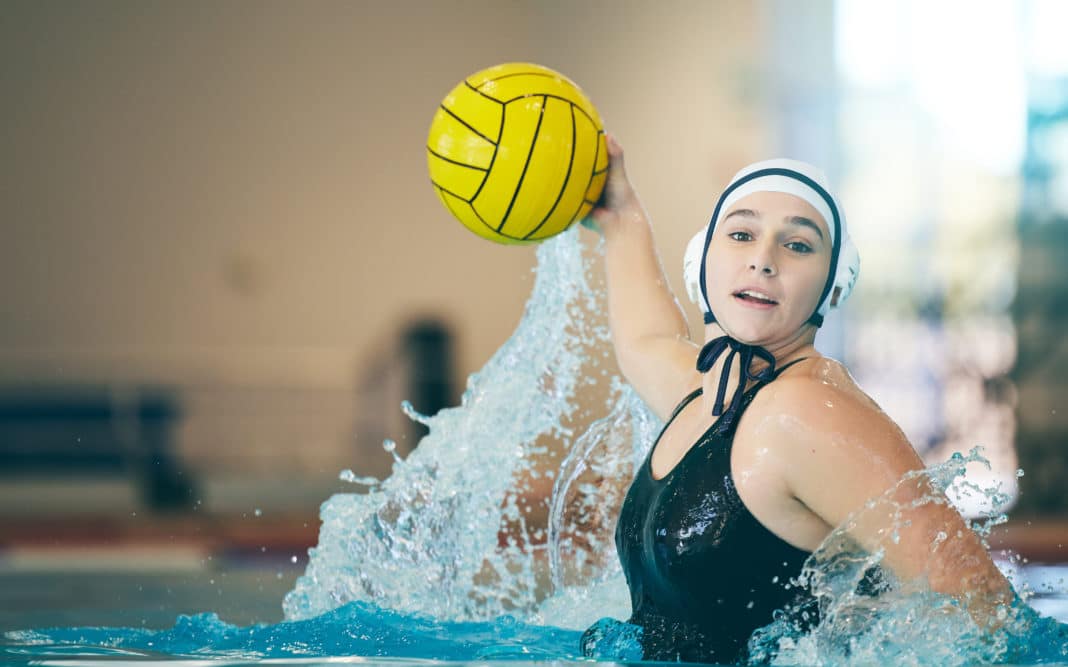 Water polo, cardio and portrait of a woman with a ball for a competition, game and training. Fitnes